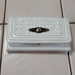 Elliot Lucca wallet